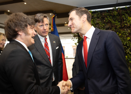 Shaking hands with Bolivia Leader
