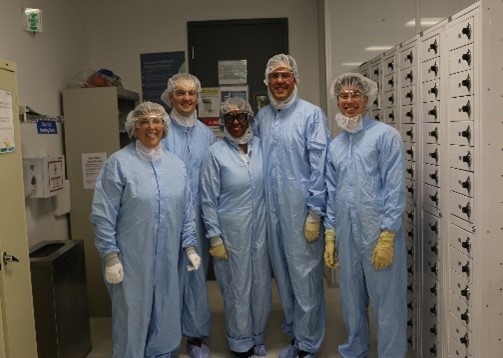 Lab employees with Chair