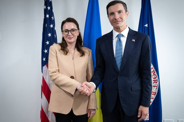 Chair Shaking hands with leader