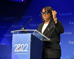 Reta Jo Lewis speaking at a lectern