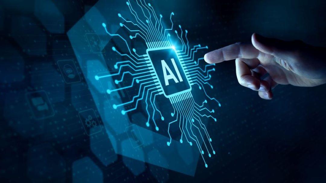Hand about to push an Artificial Intelligence (AI) button that looks like a microchip